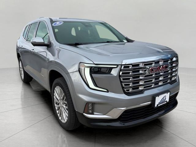 2024 GMC Acadia Denali in Sterling Metallic — front three-quarter view